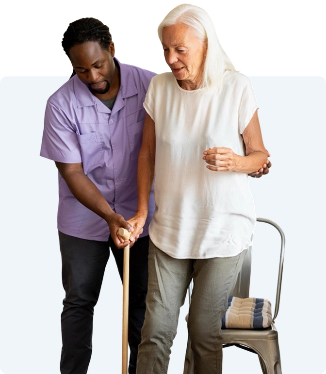 Caregiver sitting with senior woman at home