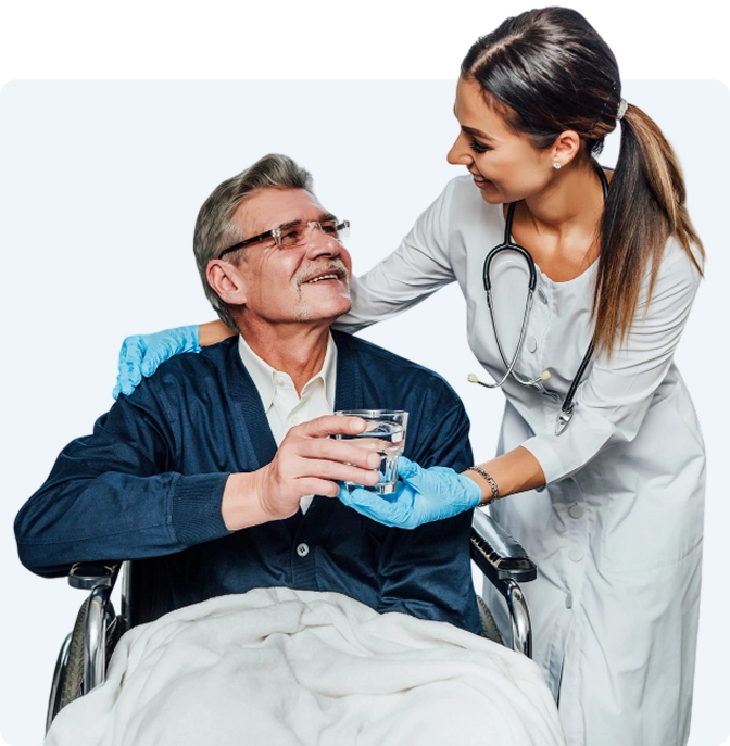 Caregiver sitting with senior woman at home